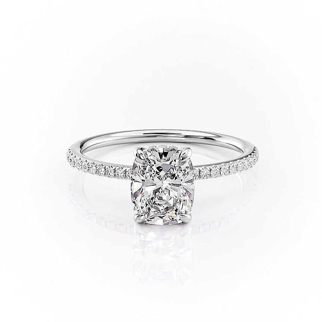 Diamond ring with a central gemstone and smaller diamonds on a white background