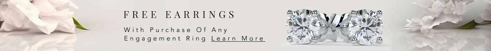 Promotional banner for free earrings with engagement ring purchase, featuring jewelry and flowers.
