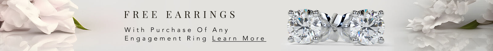 Promotional banner for free earrings with engagement ring purchase, featuring jewelry and flowers.