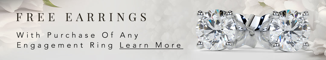 Advertisement for free earrings with any engagement ring purchase, featuring diamond earrings.