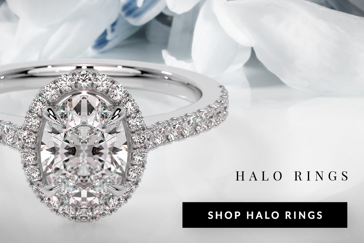 Diamond halo ring with a white flower background