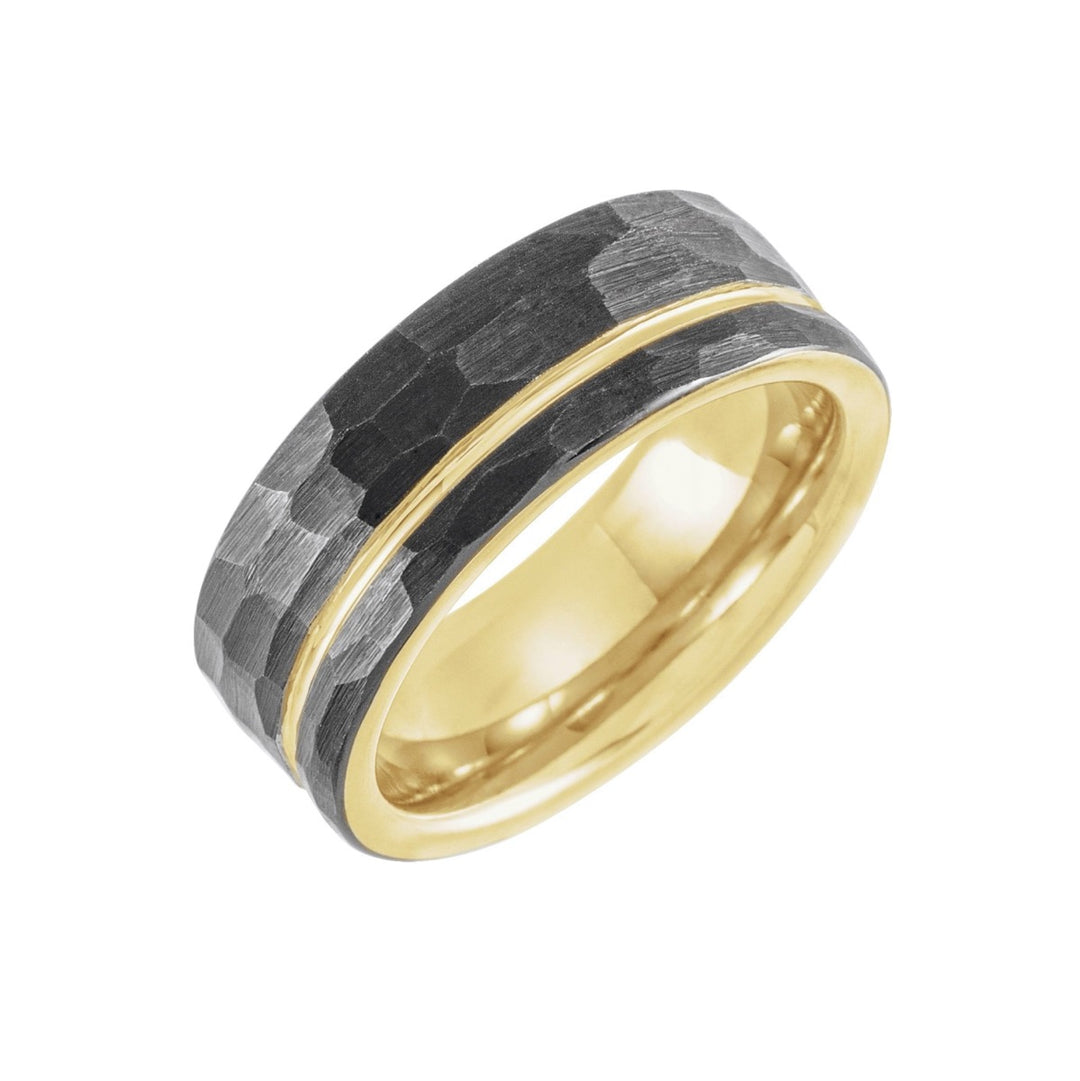 Gold and black ring on a white background