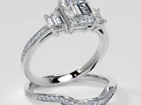 Emerald Cut Three-Stone Engagement Ring With Trapezoid Accents