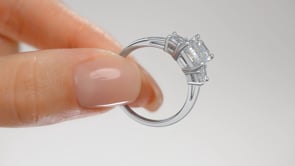 Emerald Cut Three-Stone Engagement Ring With Trapezoid Accents