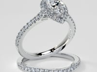 Pear Cut Halo Engagement Ring With Accents
