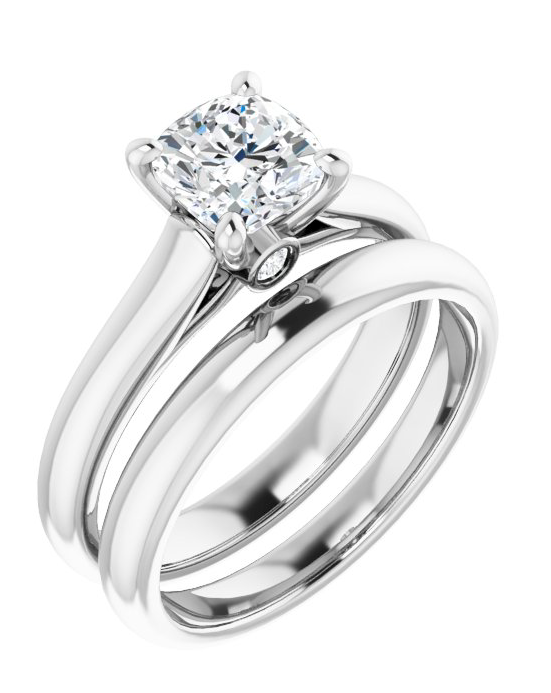 Silver ring with a large diamond on a white background