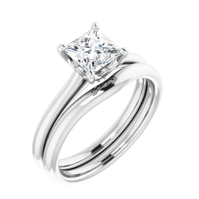 Silver ring with a prominent diamond on a white background