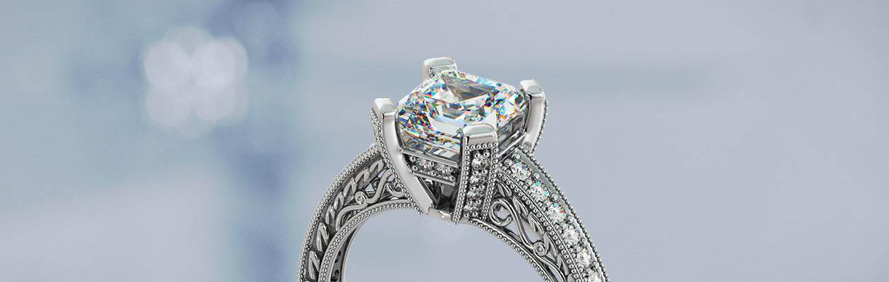 Silver ring with a diamond on a blurred background