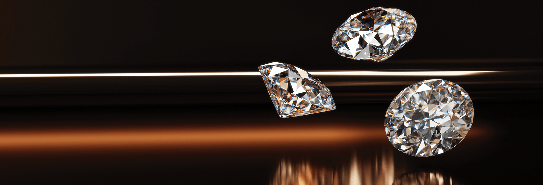 Three diamonds on a reflective surface with a dark background